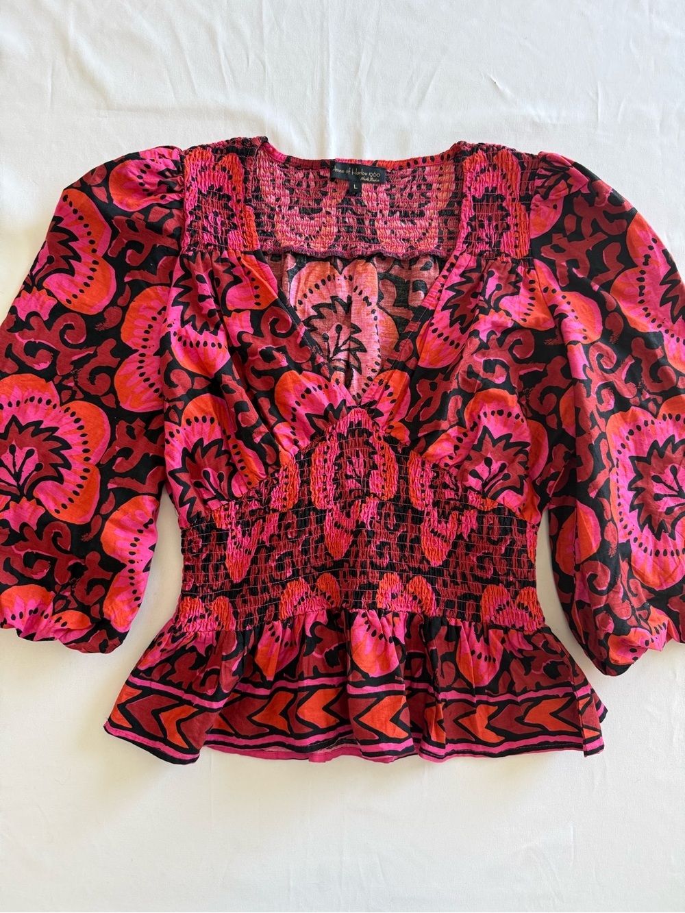 House of Harlow 1960 Pink and Black Floral Smocked Peplum Blouse